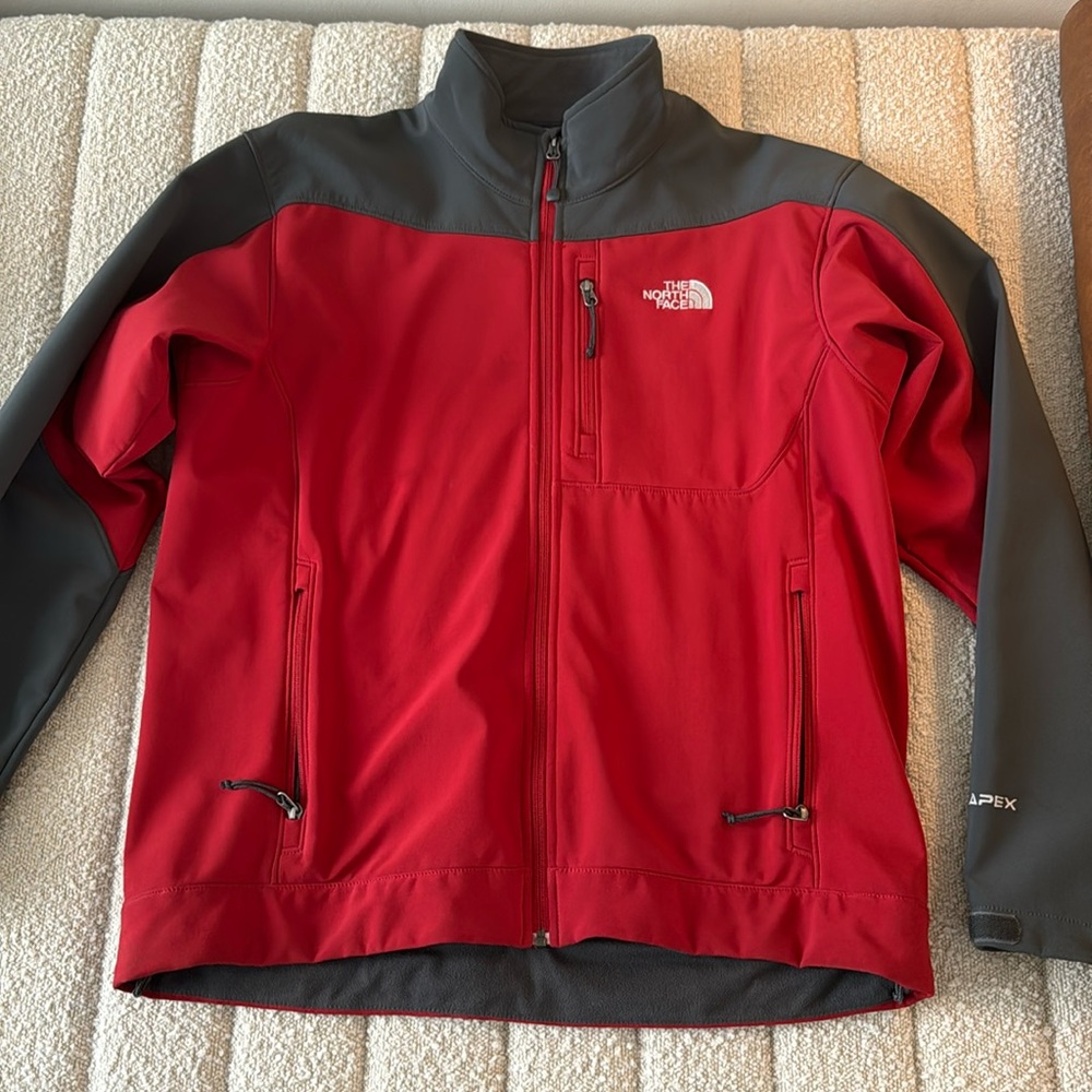 North face red apex jacket.